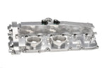 NRW-Design BMW S58 billet valve cover shown from reverse side, showcasing sleek performance design and polished metal finish.