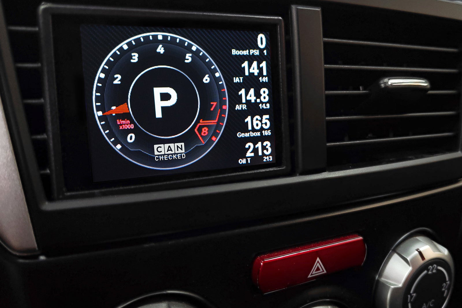 CANchecked MFD32 Gen2 3.2-inch multi-function display installed in a left-hand drive Subaru GR Impreza WRX (MK3), featuring a vehicle-specific dashboard integration.