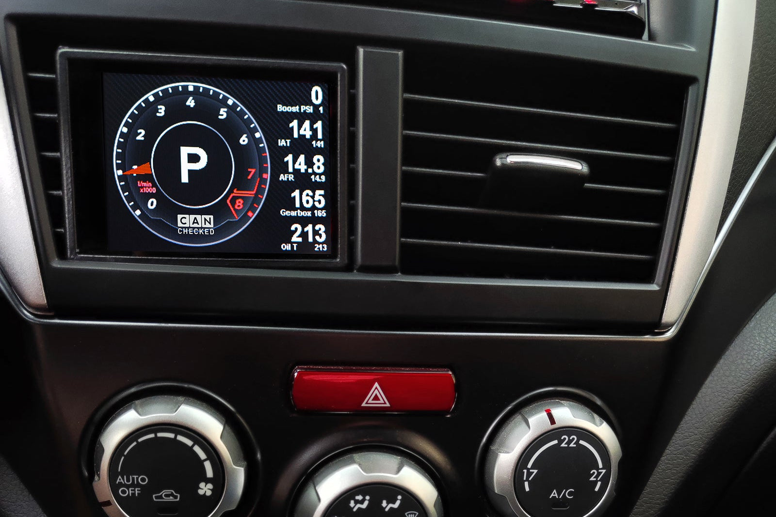 CANchecked MFD32 Gen2 3.2-inch multi-function display installed in a left-hand drive Subaru GR Impreza WRX (MK3), featuring a vehicle-specific dashboard integration.