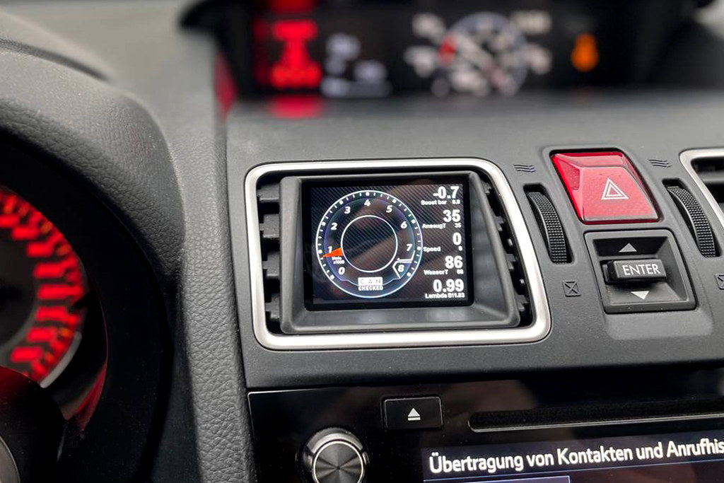 CANchecked MFD28 Gen2 2.8-inch multi-function display installed in a left-hand drive Subaru VA WRX / STI (MK4), featuring a vehicle-specific dashboard integration.