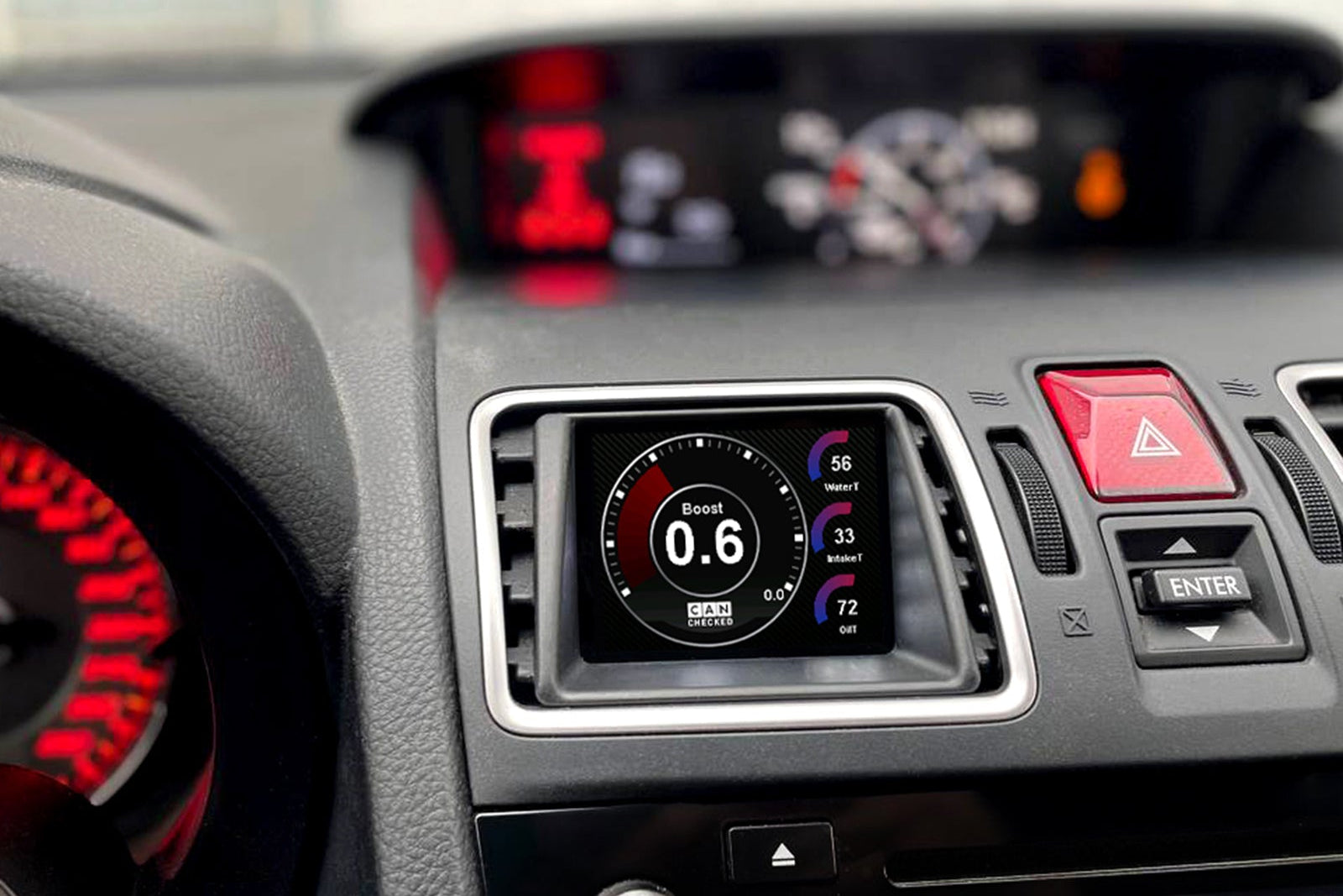 CANchecked MFD28 Gen2 2.8-inch multi-function display installed in a left-hand drive Subaru VA WRX / STI (MK4), featuring a vehicle-specific dashboard integration.