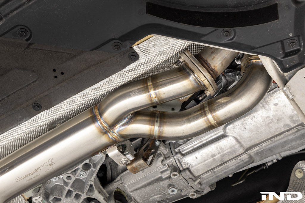 Supersprint J-pipe resonator delete package installed on a BMW G87 M2 with the factory OEM muffler, designed to deliver a more aggressive exhaust note while maintaining OEM fitment and compatibility.