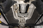 Supersprint J-pipe resonator delete package installed on a BMW G87 M2 with the factory OEM muffler, designed to deliver a more aggressive exhaust note while maintaining OEM fitment and compatibility.