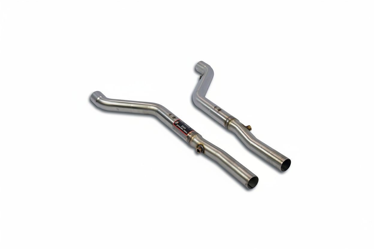 Rear 3/4 view of a stainless exhaust front pipe set from Supersprint for the BMW E31 840i on a white background.