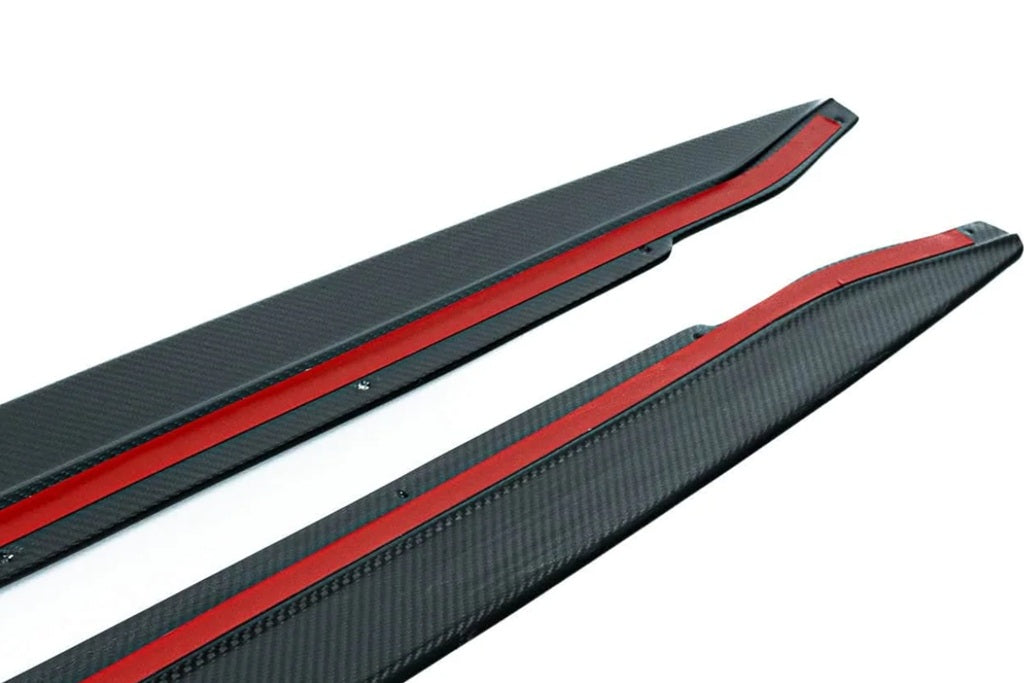 TREVORA G80 M3 pre-preg carbon fiber side skirts with pilot dimples for exterior enhancement on a BMW G80 M3.