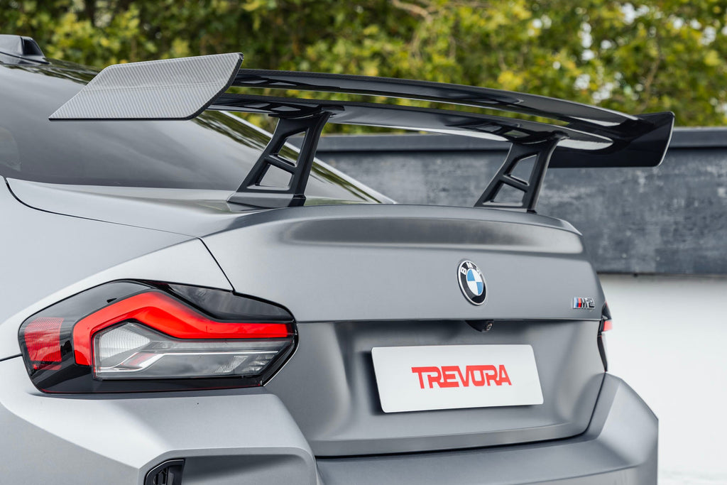 TREVORA G87 M2 TR87 Track Pack Adjustable Rear Wing installed on a BMW G87 M2, featuring a twin-plane pre-preg carbon fibre design engineered to increase aerodynamic efficiency and rear downforce.