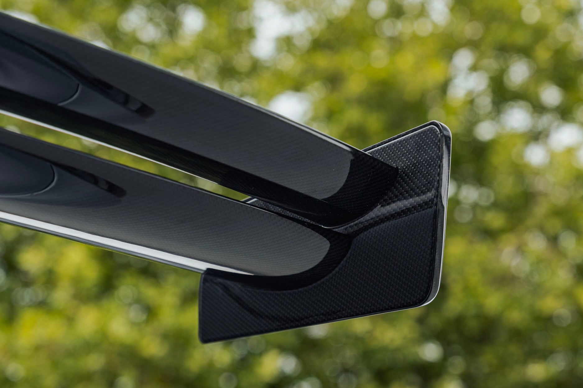 TREVORA G87 M2 TR87 Track Pack Adjustable Rear Wing installed on a BMW G87 M2, featuring a twin-plane pre-preg carbon fibre design engineered to increase aerodynamic efficiency and rear downforce.