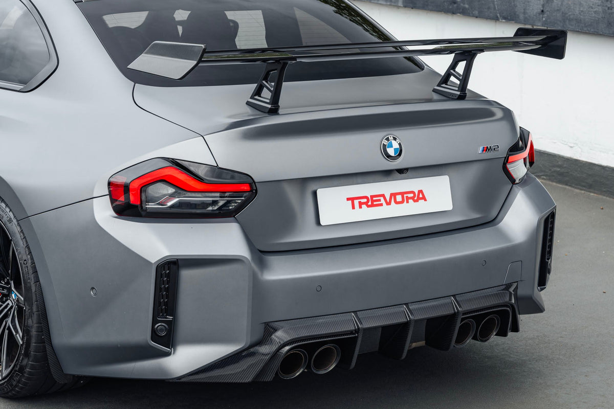 TREVORA G87 M2 TR87 Track Pack Adjustable Rear Wing installed on a BMW G87 M2, featuring a twin-plane pre-preg carbon fibre design engineered to increase aerodynamic efficiency and rear downforce.