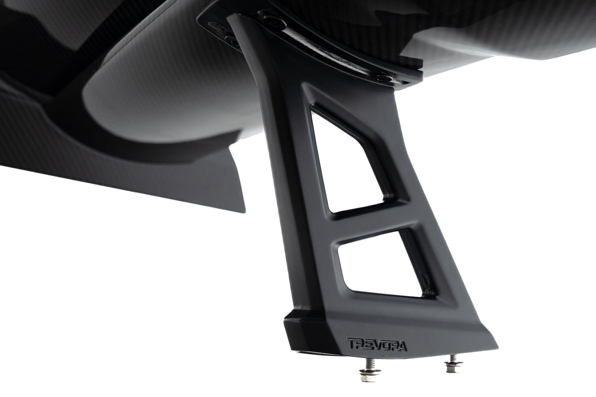 TREVORA G87 M2 TR87 Track Pack Adjustable Rear Wing shown on a white background, featuring twin-plane pre-preg carbon fibre construction, adjustable aerodynamic settings, and black anodized wing mounts.