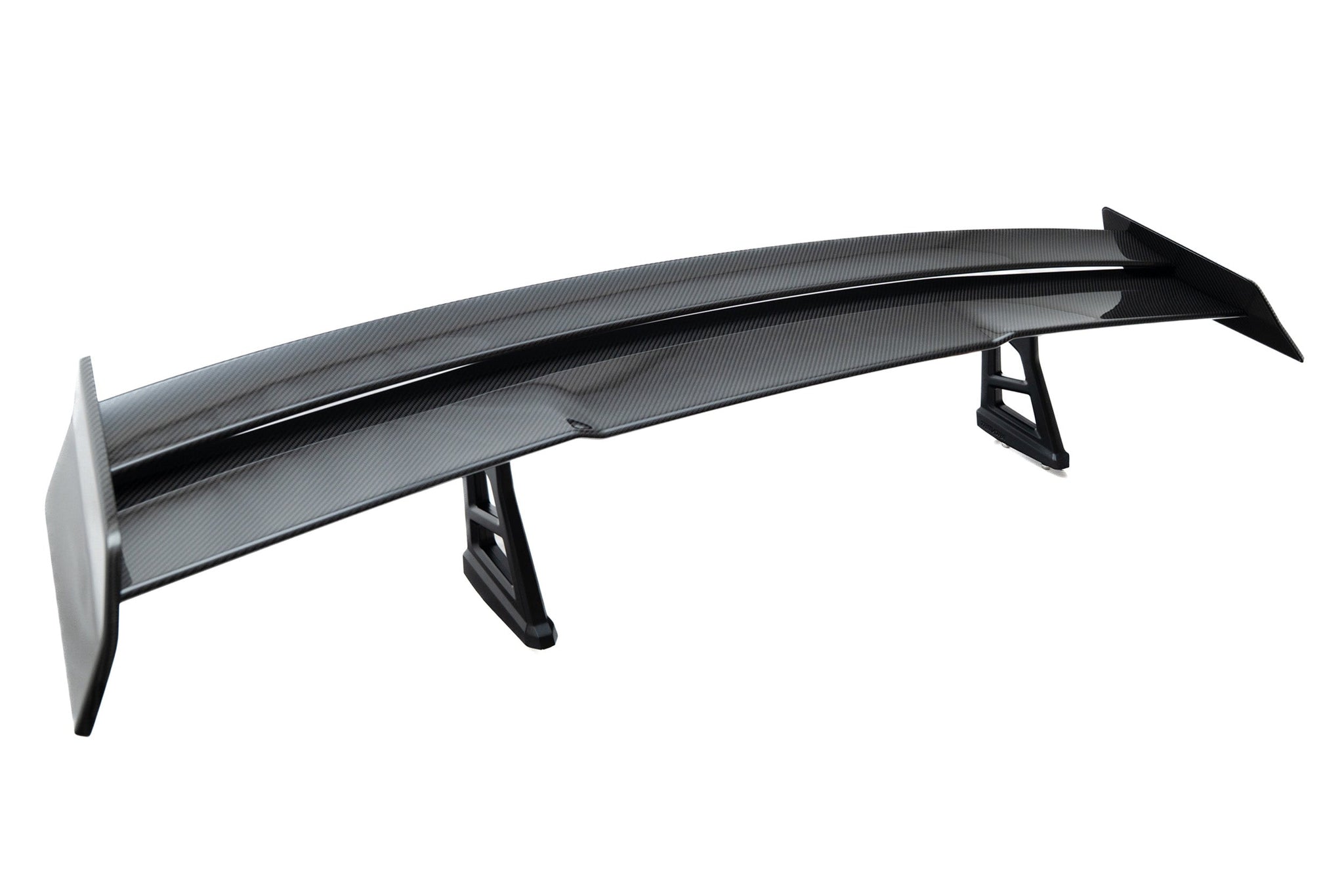 TREVORA G87 M2 TR87 Track Pack Adjustable Rear Wing shown on a white background, featuring twin-plane pre-preg carbon fibre construction, adjustable aerodynamic settings, and black anodized wing mounts.