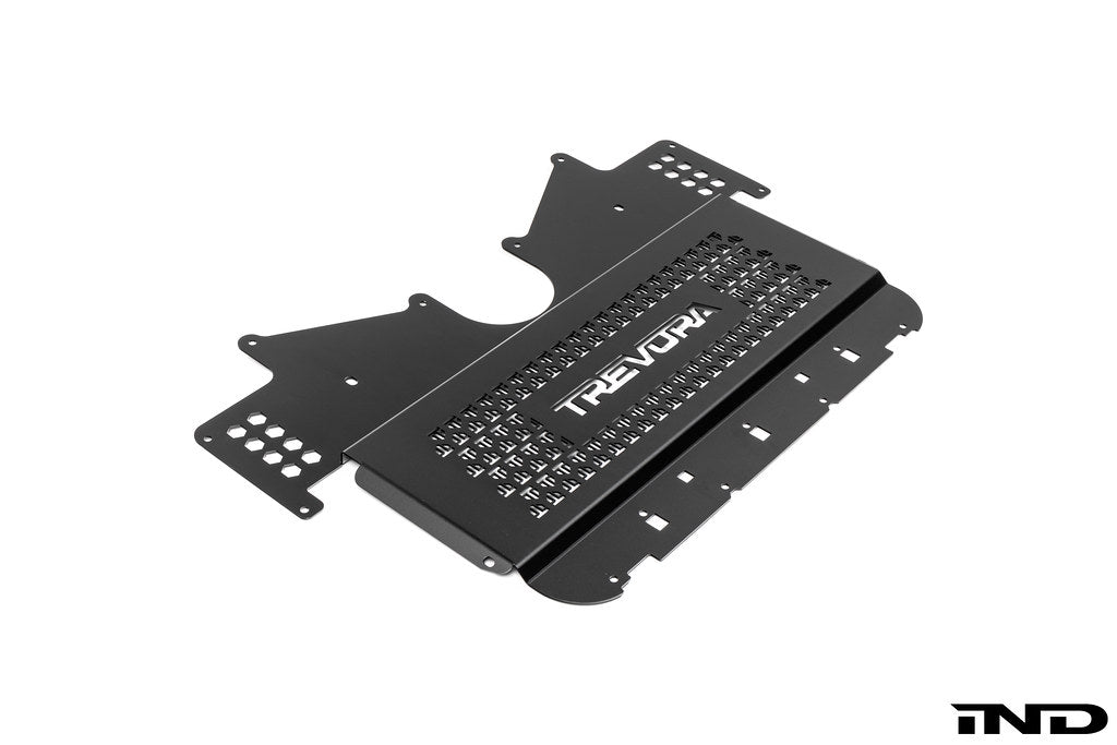 TREVORA G8X M2 M3 M4 metal skid plate under tray designed to protect the underside of the vehicle from road and track debris, shown on a white background.