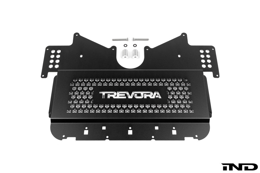 TREVORA G8X M2 M3 M4 metal skid plate under tray designed to protect the underside of the vehicle from road and track debris, shown on a white background.