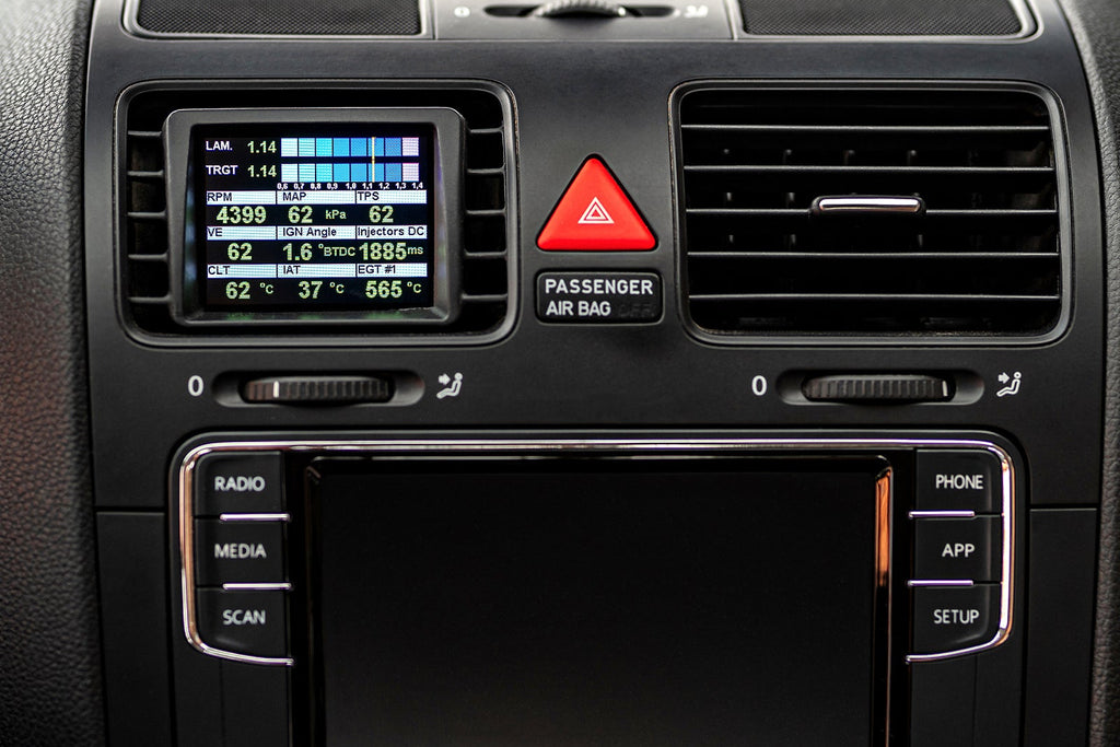 CANchecked MFD28 Gen2 2.8-inch multi-function display installed in a Volkswagen MK5 Golf, compatible with left-hand drive and right-hand drive models, featuring a vehicle-specific dashboard integration.
