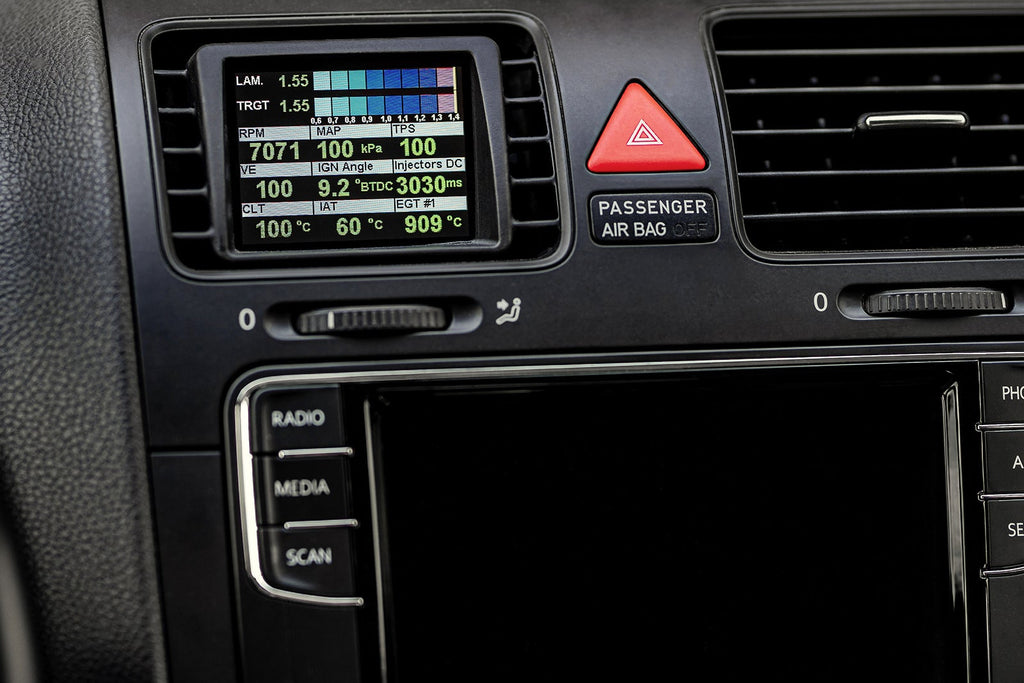 CANchecked MFD28 Gen2 2.8-inch multi-function display installed in a Volkswagen MK5 Golf, compatible with left-hand drive and right-hand drive models, featuring a vehicle-specific dashboard integration.