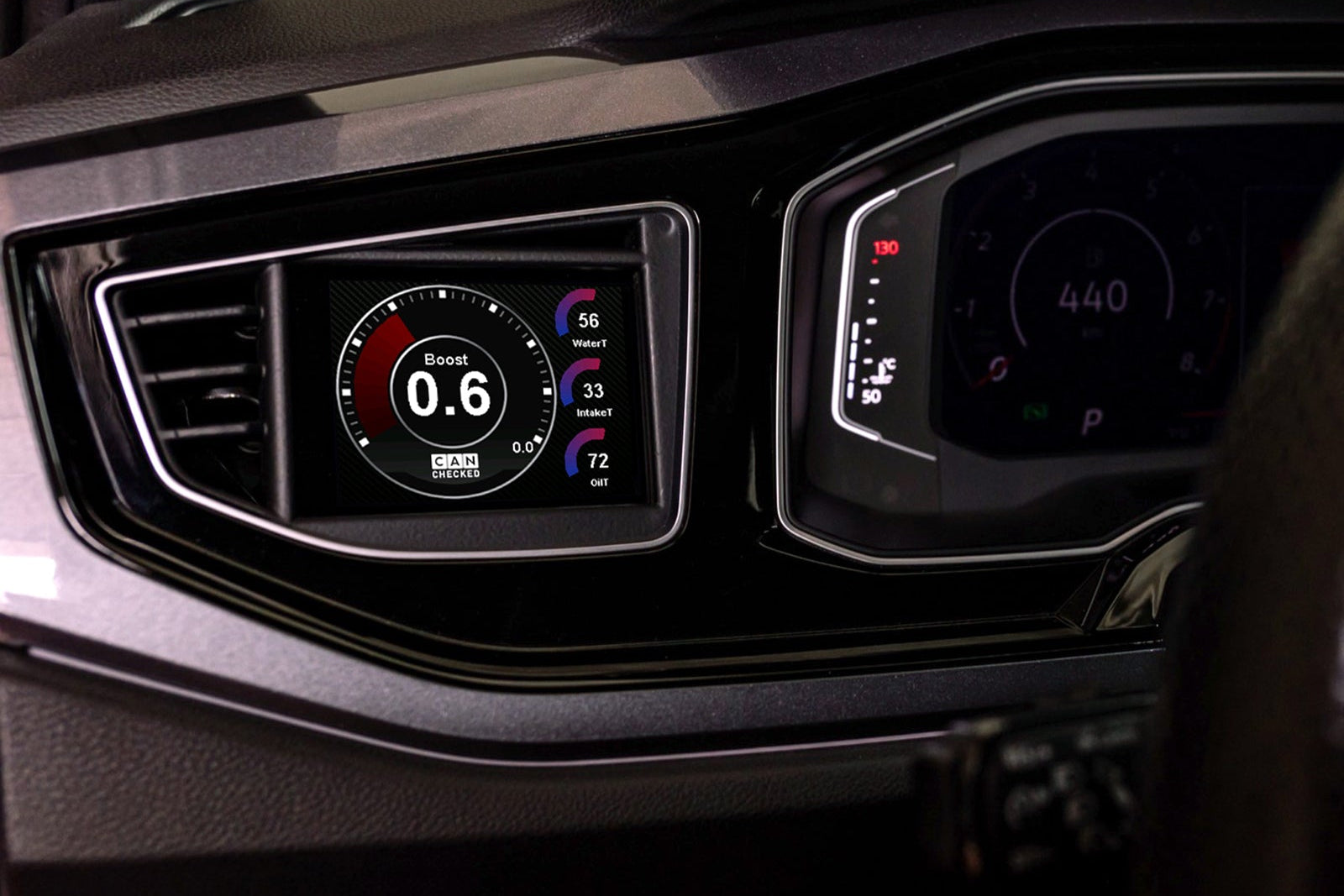CANchecked MFD32 Gen2 3.2-inch multi-function display installed in a left-hand drive Volkswagen MK6 Polo, featuring a vehicle-specific dashboard integration.