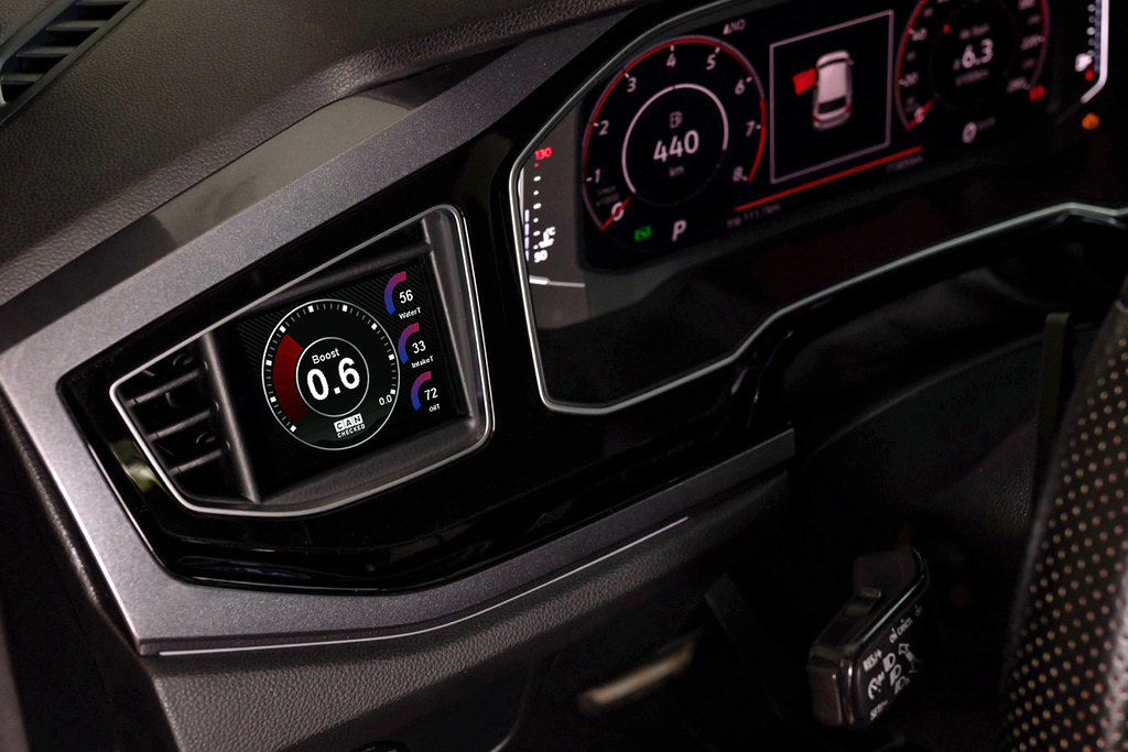 CANchecked MFD32 Gen2 3.2-inch multi-function display installed in a left-hand drive Volkswagen MK6 Polo, featuring a vehicle-specific dashboard integration.