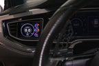 CANchecked MFD32 Gen2 3.2-inch multi-function display installed in a left-hand drive Volkswagen MK6 Polo, featuring a vehicle-specific dashboard integration.