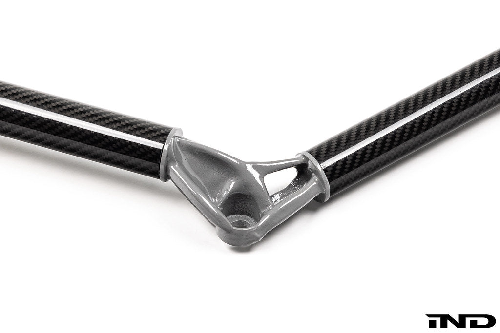 AptusWorks ACX A90/A91 MKV Supra DMLS carbon strut brace mounted on a suspension system with a white background.