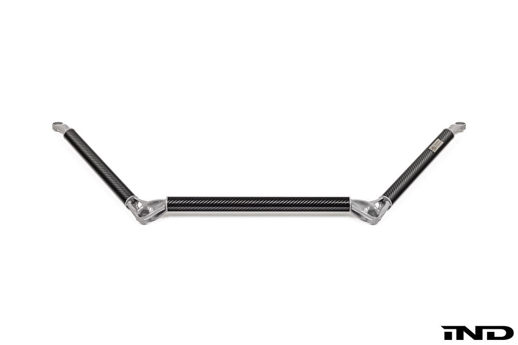 AptusWorks ACX A90/A91 MKV Supra DMLS carbon strut brace mounted in a suspension setup on a white background.