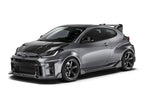 ADRO Toyota GR Yaris with carbon fiber front lip installed, showcasing an exterior view from an angled perspective.