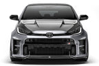 ADRO Toyota GR Yaris with carbon fiber front lip installed, showcasing sporty exterior upgrade on the front bumper.