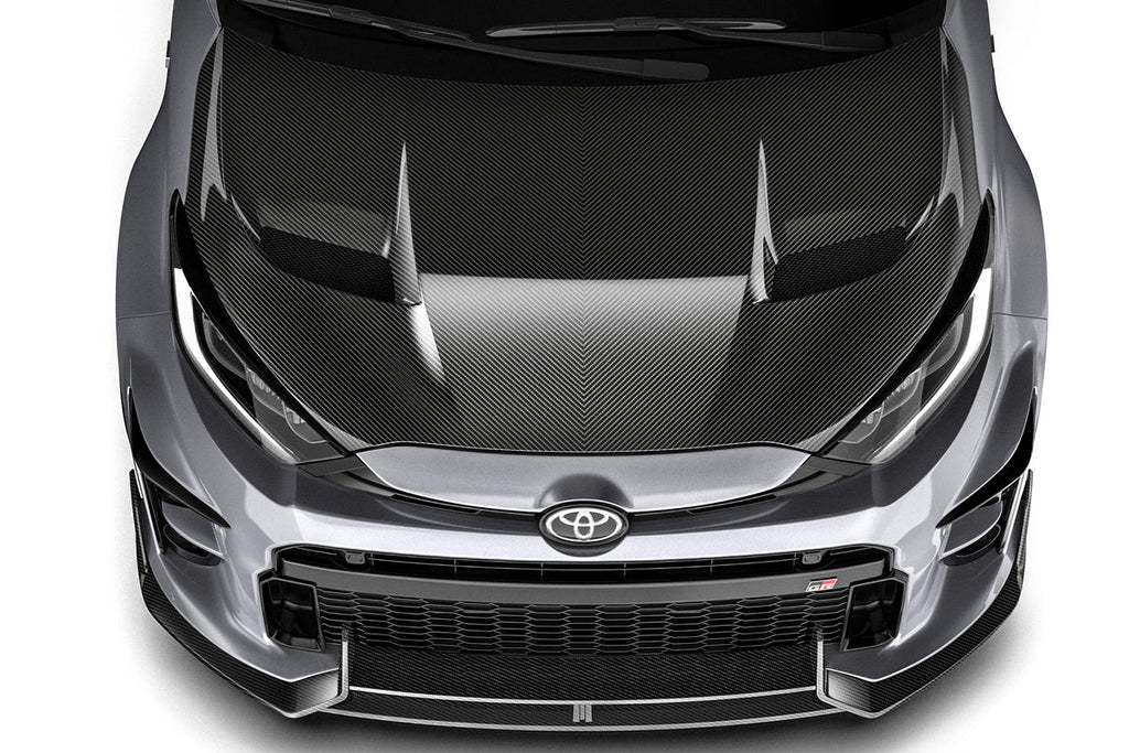 ADRO Toyota GR Yaris with prepreg carbon fiber hood installed, showcasing the lightweight, high-performance exterior upgrade.