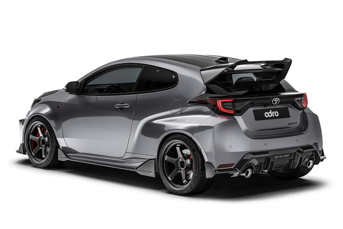 ADRO Toyota GR Yaris exterior carbon fiber rear diffuser installed on the right side of the vehicle.