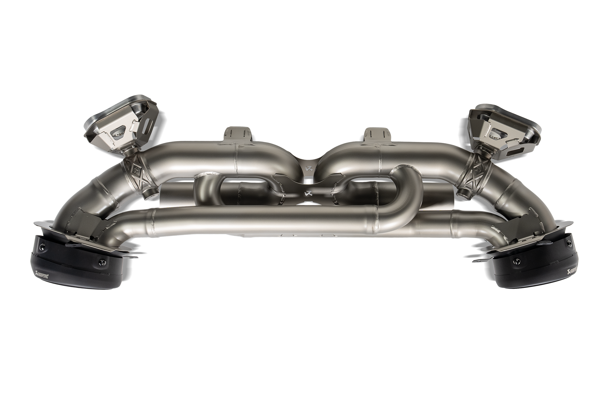 Akrapovič Porsche 992.1 Carrera GTS Dakar Slip-On Race Exhaust system installed on a sports car, showcasing the high-performance exhaust.