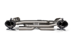 Akrapovič Porsche 992.1 Carrera GTS Dakar Slip-On Race Exhaust showing sleek black carbon fiber finish and polished exhaust tips.