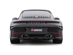 Akrapovič Porsche 992.2 Carrera T slip-on exhaust system installed on the rear of the vehicle, showing the sleek exhaust tips.