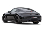 Akrapovič Porsche 992.2 Carrera T slip-on exhaust system with valve, showcasing polished metal and branding details.