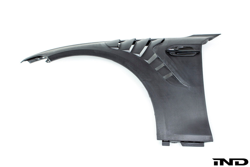 Alpha N BMW F87 M2 carbon fender set with lightweight, aerodynamic design, shown on a white background.