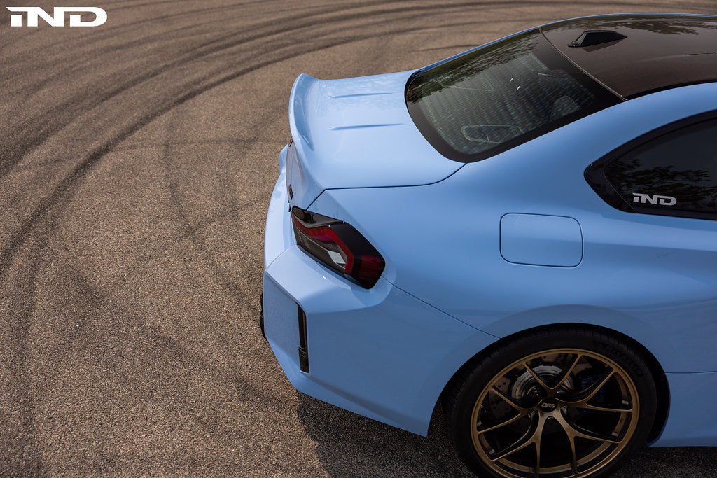 Alpha N BMW G87 M2 CSL carbon trunk lid installed, showcasing sleek exterior design and lightweight carbon fiber construction.