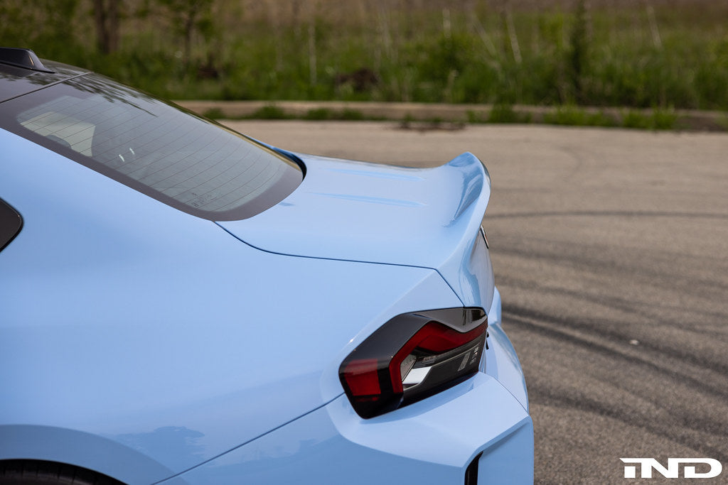 Alpha-N BMW G87 M2 CSL carbon fiber trunk lid installed on exterior of car, showcasing lightweight, aerodynamic design.