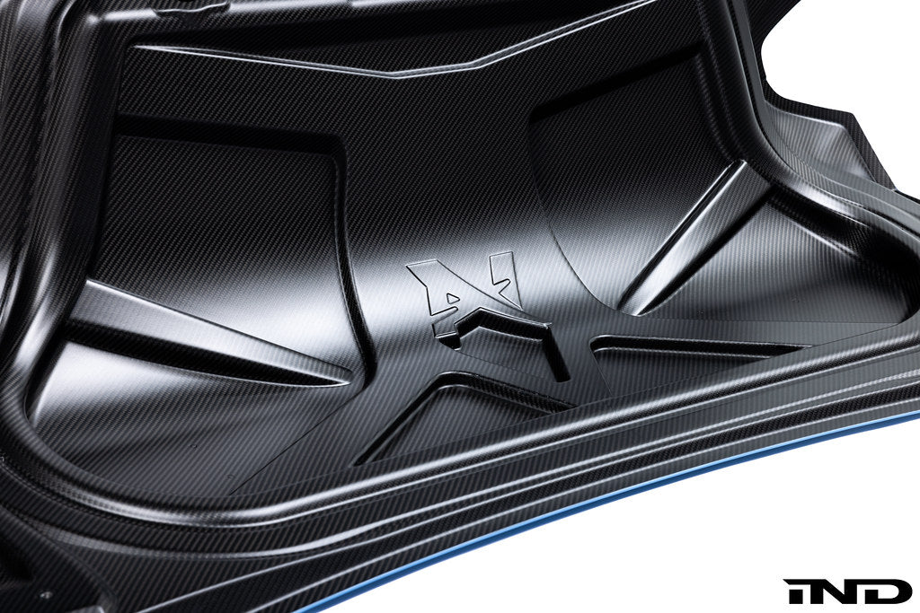 Alpha-N BMW G87 M2 CSL carbon trunk lid exterior part on a white background.