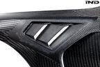 Alpha N carbon vented front fender set for BMW G8X M3 and M4, with a sleek exterior design on a white background.