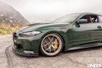 Alpha N G8X M3 M4 carbon vented front fenders installed on a BMW G8X M3 M4 exterior car modification.