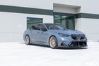 Alpha N BMW G90 G99 M5 carbon front splitter set with three-piece exterior installation on vehicle.