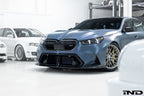 Alpha N BMW G90 G99 M5 carbon front splitter set, 3-piece exterior upgrade installed on vehicle, enhancing sporty aerodynamic look.
