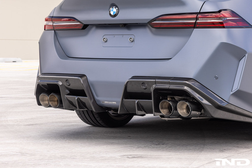 Eisenmann G90 G99 M5 Race Performance Exhaust System installed with carbon rear diffuser on BMW G90/G99 M5.