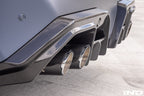 Eisenmann G90 G99 M5 Performance Exhaust System Race installed on BMW G90 G99 M5 with carbon rear diffuser visible.