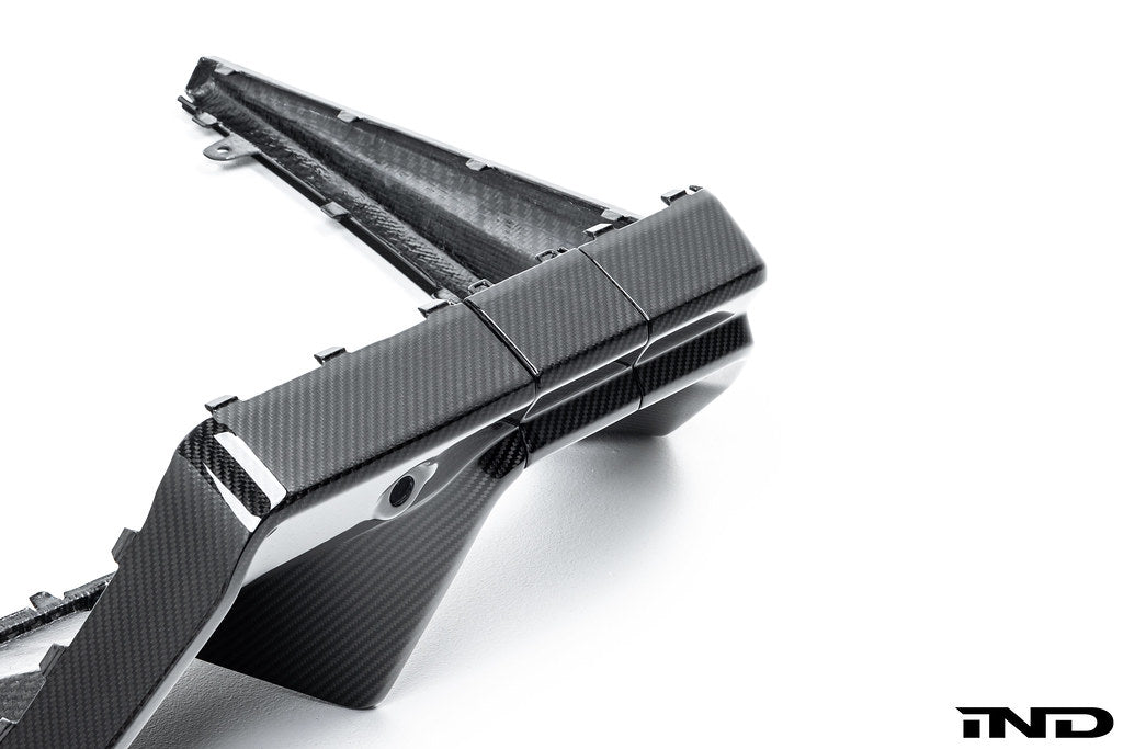 Alpha N G90 G99 M5 Carbon Rear Diffuser V2 for BMW, showcasing sleek white exterior rear diffuser with detailed carbon fiber texture.