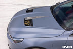 Alpha N BMW G90 G99 M5 carbon vented hood installed on the vehicle, showcasing lightweight aerodynamic exterior design.