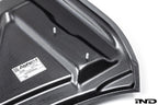 Alpha N BMW G90 G99 M5 carbon vented hood exterior view on white background, showcasing lightweight design and venting features.