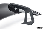 Alpha N Alpha-N Carbon SN rear wing mounted on a car, showcasing its sleek exterior design on a white background.
