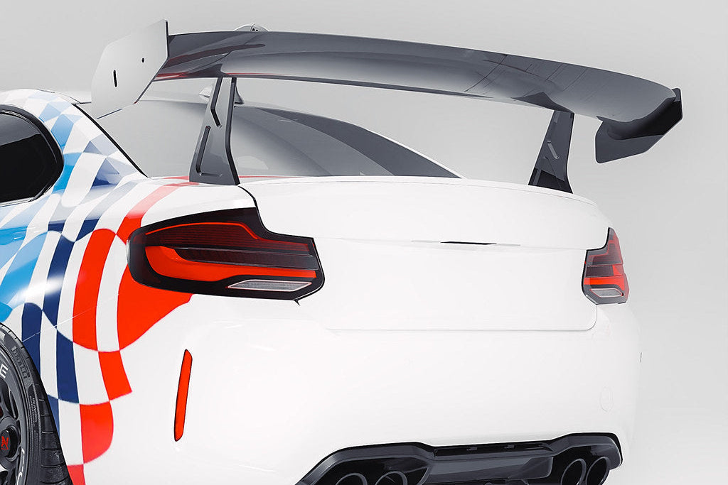 Alpha N Corse Swan Neck Rear Wing installed on a BMW F87 M2, white background showcasing the exterior aerodynamic car part.
