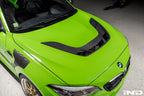 Alpha N F87 M2 Carbon Corse vented hood installed, showing its lightweight carbon fiber design and aerodynamic vents.