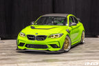 Alpha-N F87 M2 Competition front splitter installed on car, showcasing carbon Corse exterior upgrade for enhanced aerodynamics.