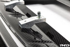 Alpha-N G87 M2 Carbon Corse front splitter on a white background, showcasing its sleek aerodynamic design for BMW M2.