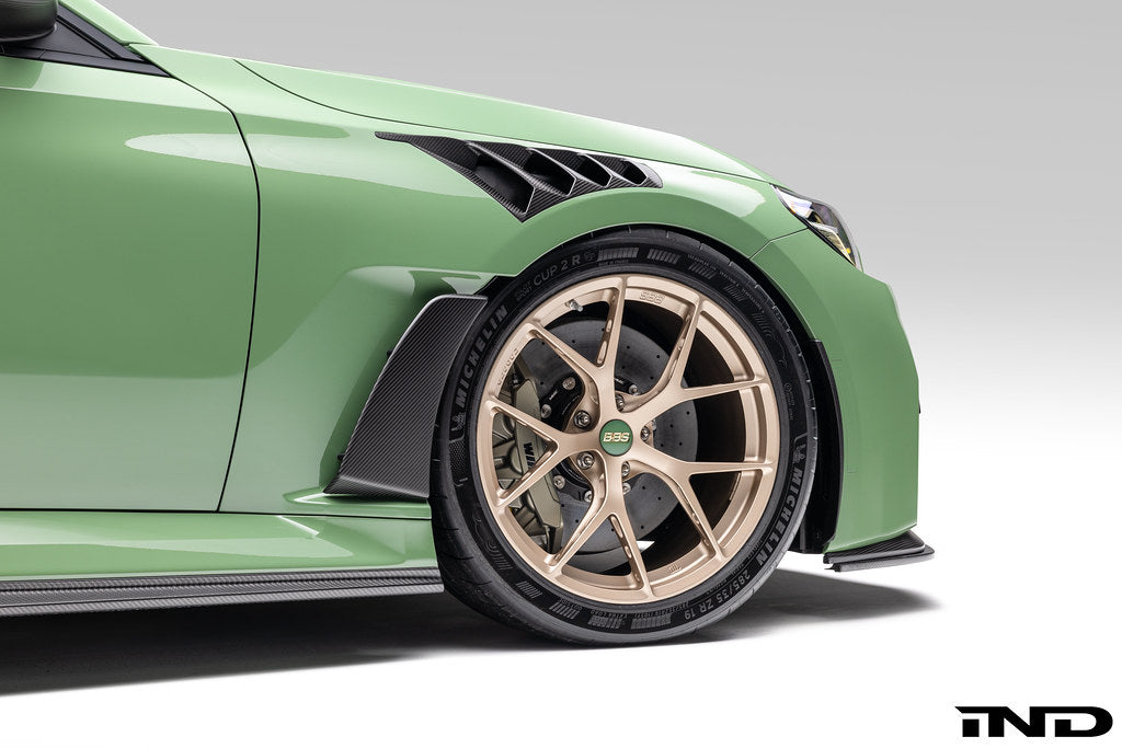 Alpha N G87 M2 Carbon Vented Front Fender Set V4 with blades installed on a BMW M2 exterior car.